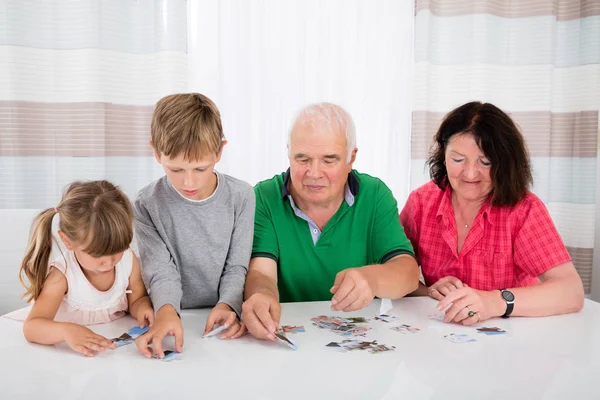 Grandparents and grandchildren spending time together — Stock Photo, Image