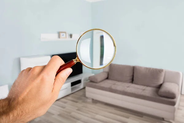 Person Checking Living Room — Stock Photo, Image