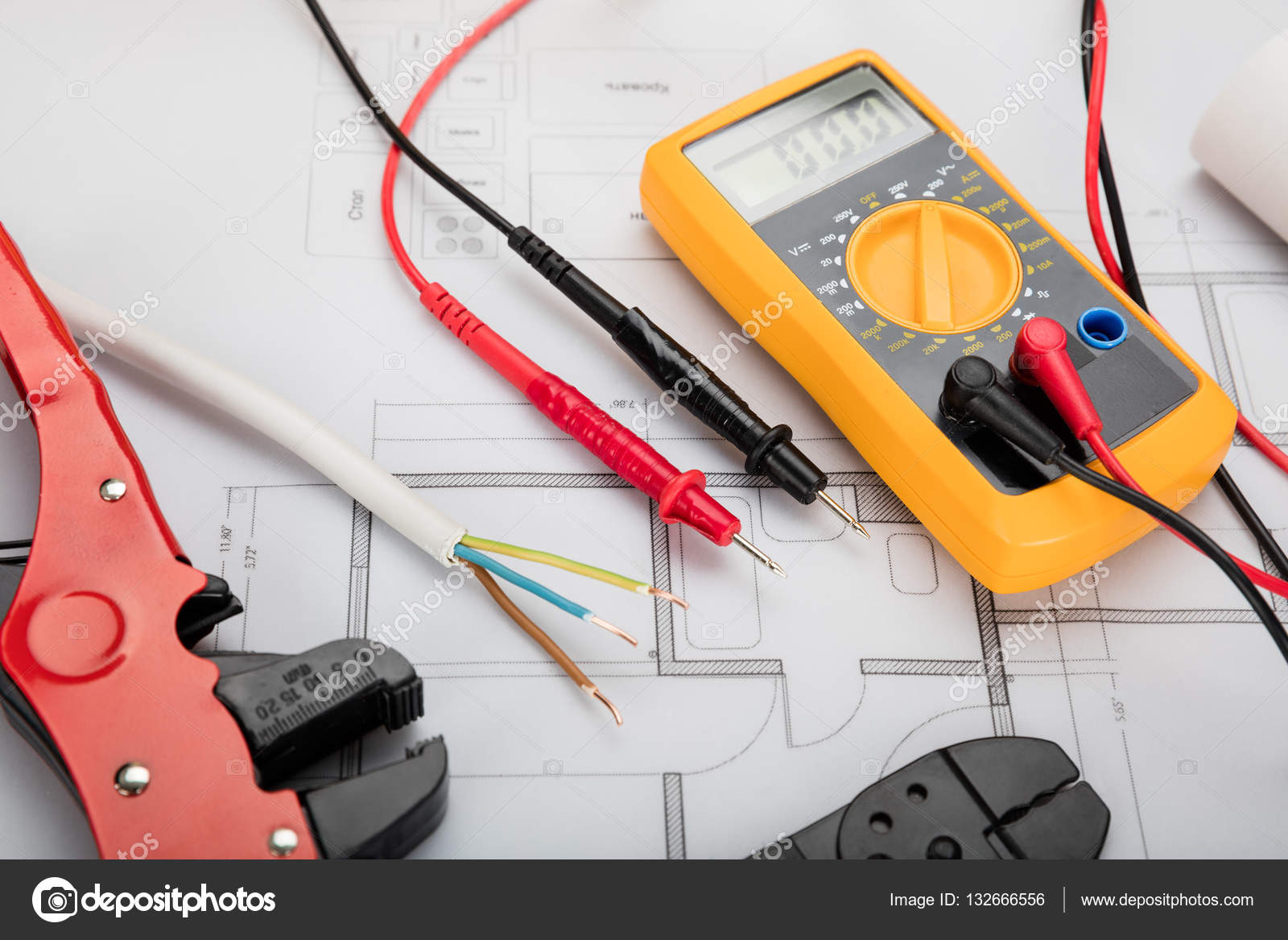 Digital multimeter on blueprint — Stock Photo © AndreyPopov 132666556