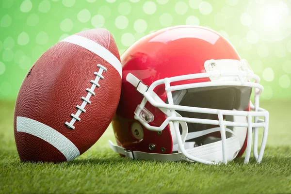 Rugby helmet with ball — Stock Photo, Image