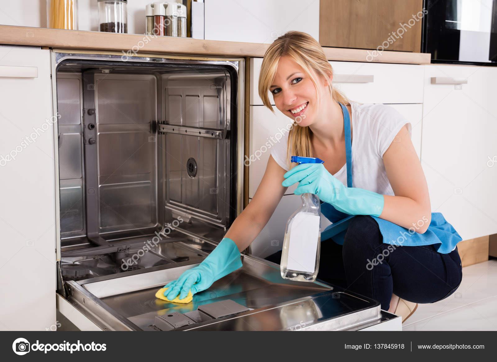 Woman Cleaning Dishwasher Stock Photo Woman Cleaning Dishwasher Stock Photo