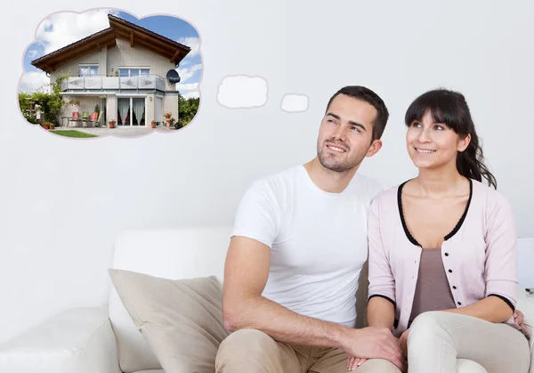 Couple Thinking Of House — Stock Photo, Image