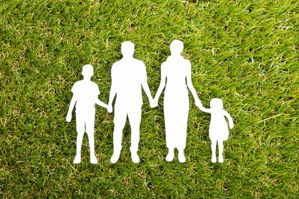 Family Papercut On Grass — Stock Photo, Image