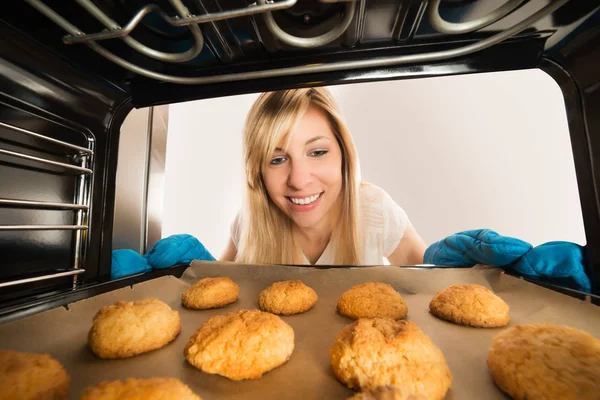 Woman Looking On Cookies — Stock Photo, Image