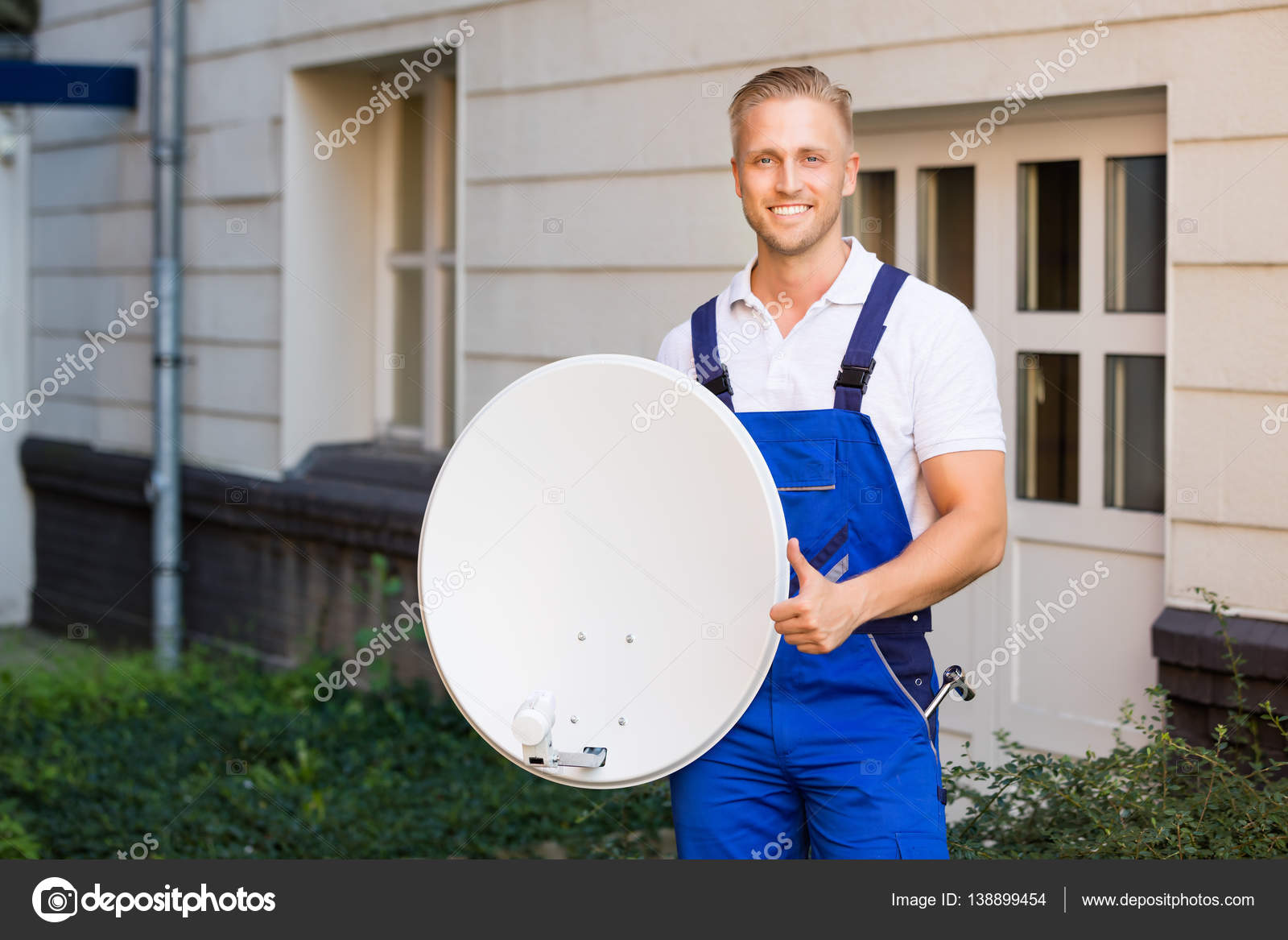 technician with tv dish stock photo andreypopov 138899454 dish technician