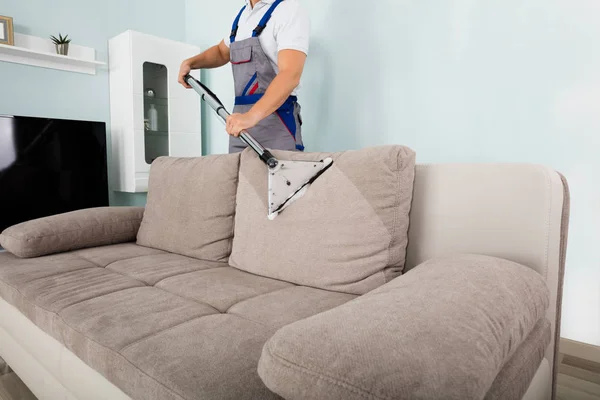 Worker Cleaning Sofa — Stock Photo, Image