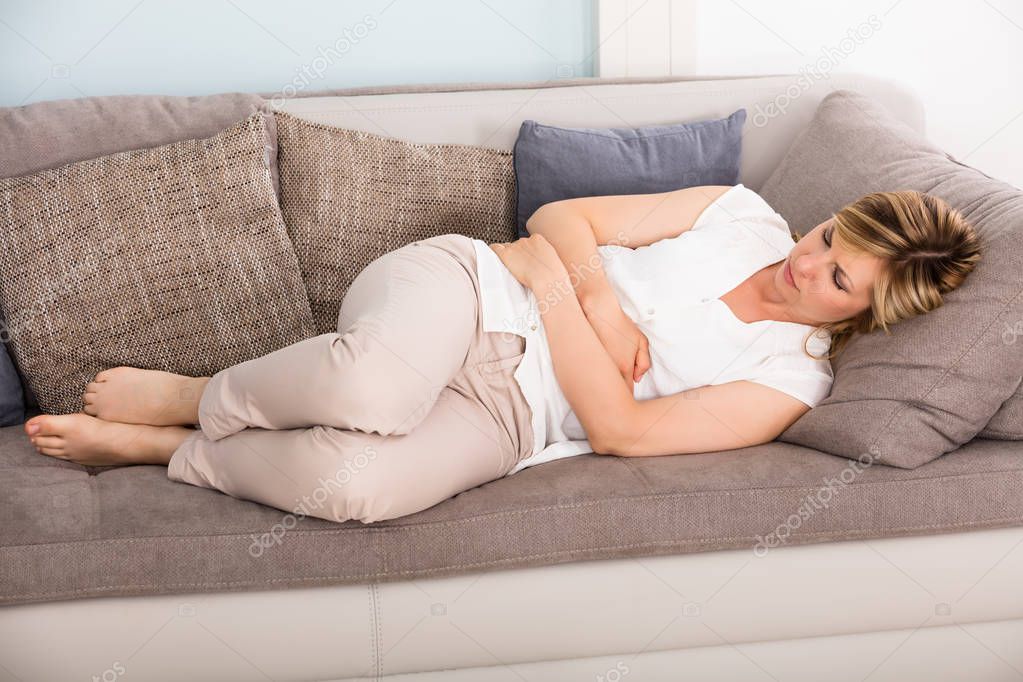 Woman Sleeping On Sofa