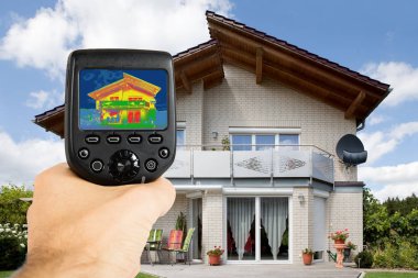 Person Using Infrared Camera clipart