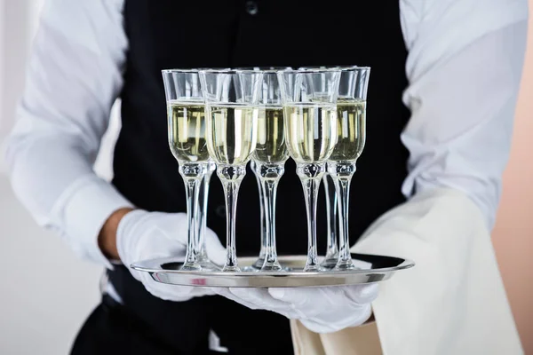 Man Holding Champagne Glasses — Stock Photo, Image