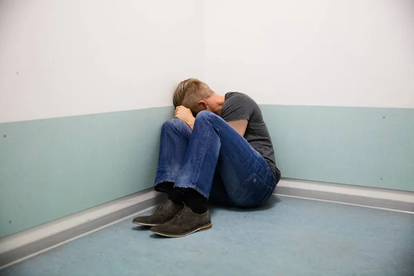 Man Sitting At Corner — Stock Photo, Image