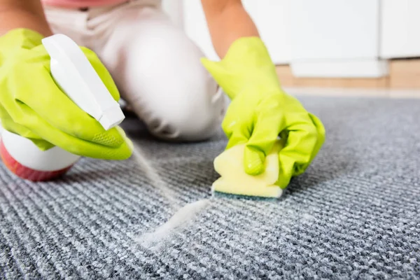 Woman Spraying Detergent — Stock Photo, Image