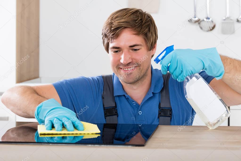 Janitor Cleaning Induction Stove