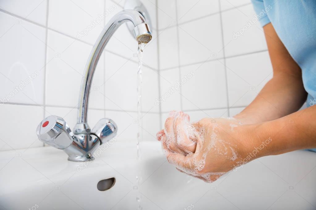 Woman Applying Soap 