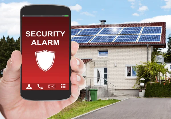 Persoon met Security Alarm — Stockfoto