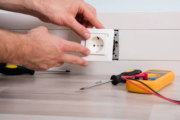 Person Installing Socket On Wall — Stock Photo, Image