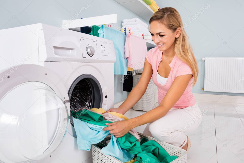 Woman Putting Clothes
