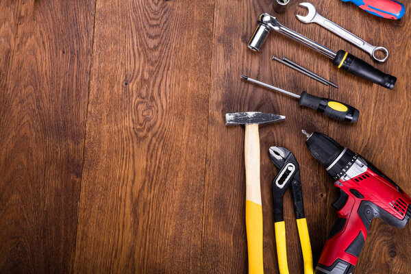 Construction Tools On Wooden Desk
