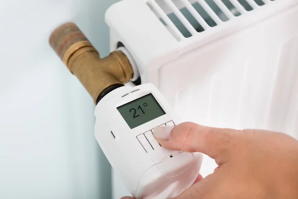 Person Adjusting Temperature — Stock Photo, Image