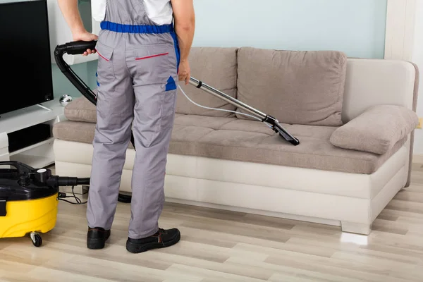 Worker Cleaning Sofa — Stock Photo, Image