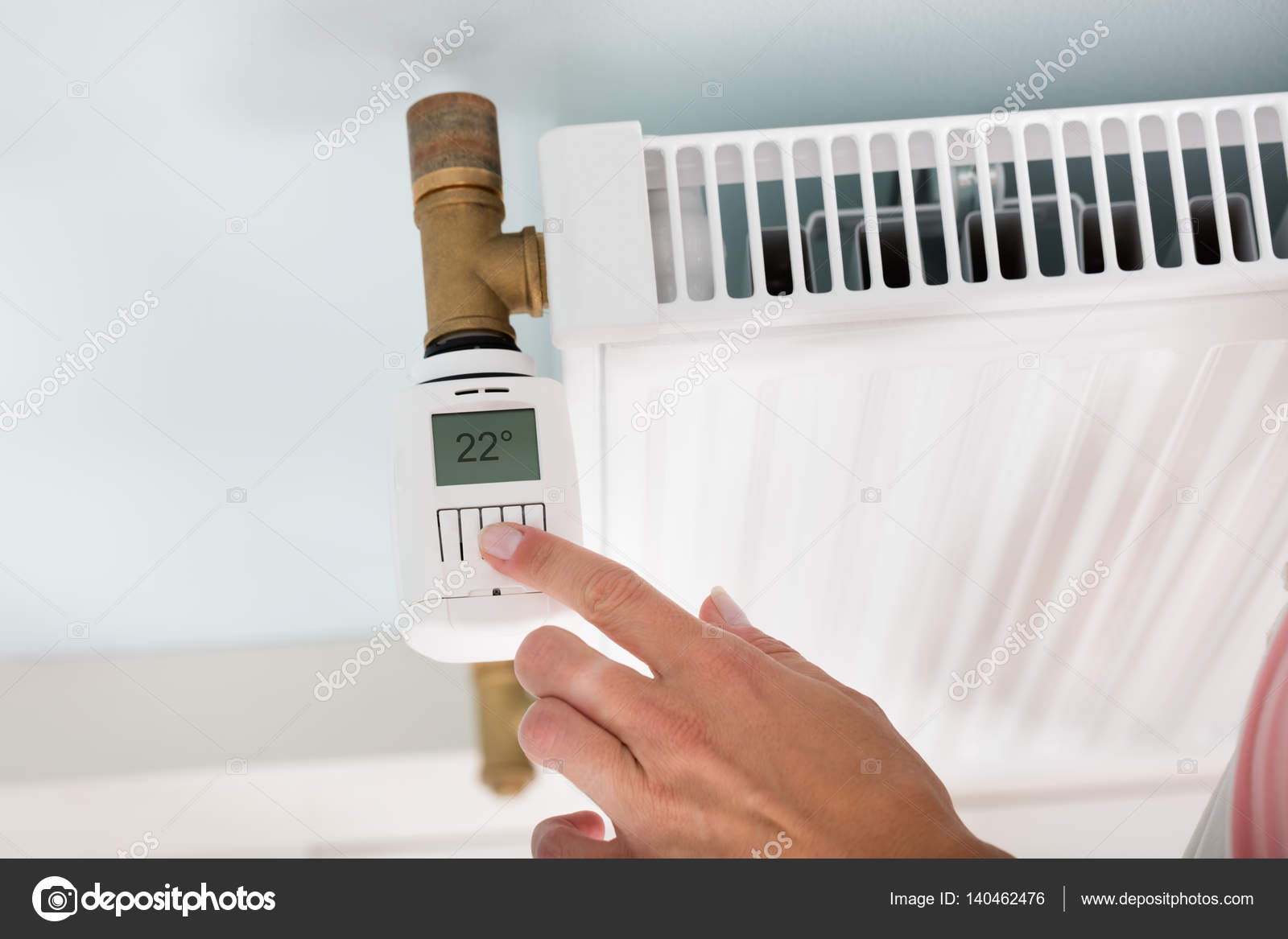Person Adjusting Temperature — Stock Photo © AndreyPopov 140462476