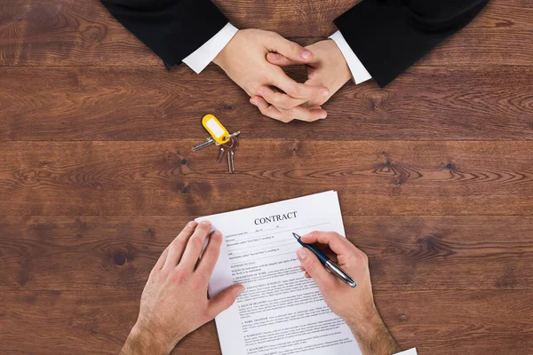 Businessman Filling Contract Form — Stock Photo, Image