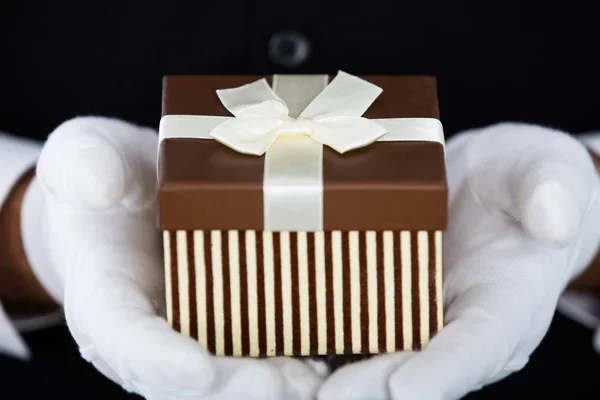 Waiter Presenting Small Gift — Stock Photo, Image