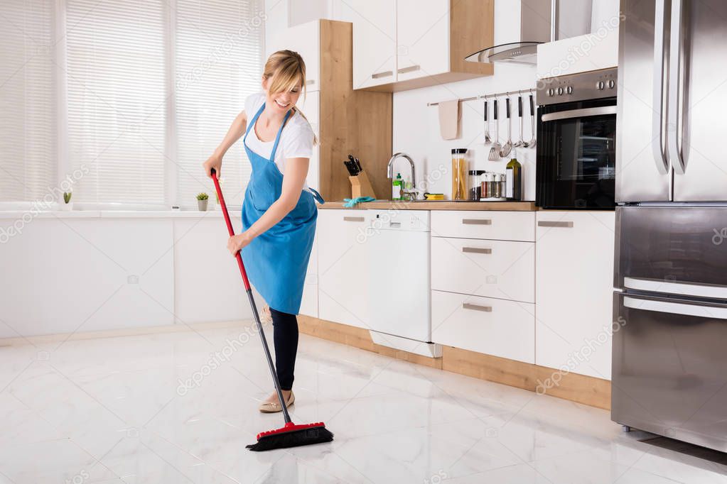 Housemaid Sweeping Floor