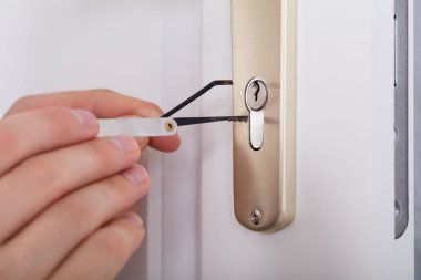 Locksmith Fixing Door Handle clipart