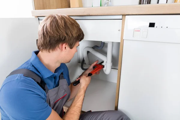 Plumber Fixing Sink Pipe — Stock Photo, Image