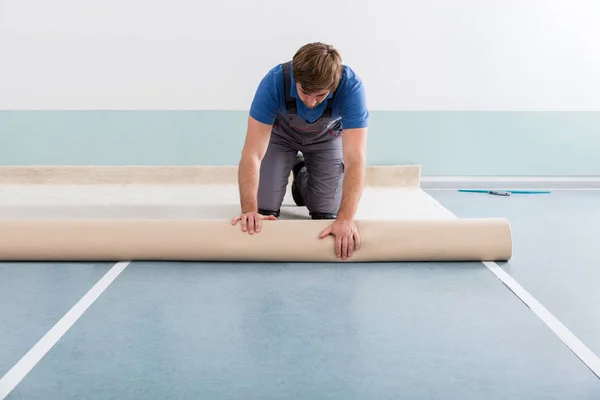 Young Man Laying Carpet — Stock Photo, Image