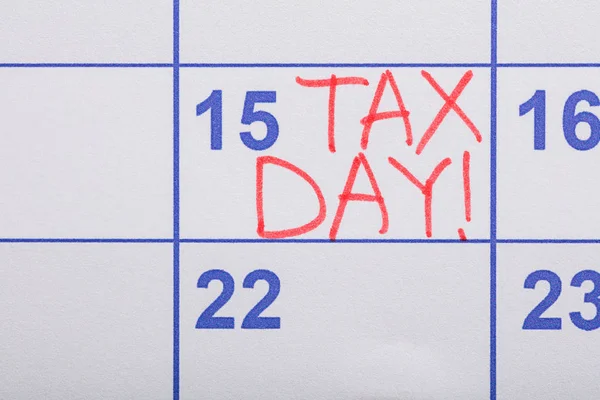 Tax Day Inscription On Calendar