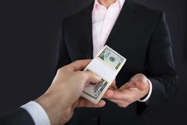 Businessman Receiving Banknotes — Stock Photo, Image