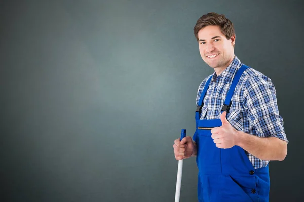 Janitor com o polegar para cima — Fotografia de Stock