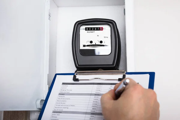 Technician Writing Reading Of Meter — Stock Photo, Image