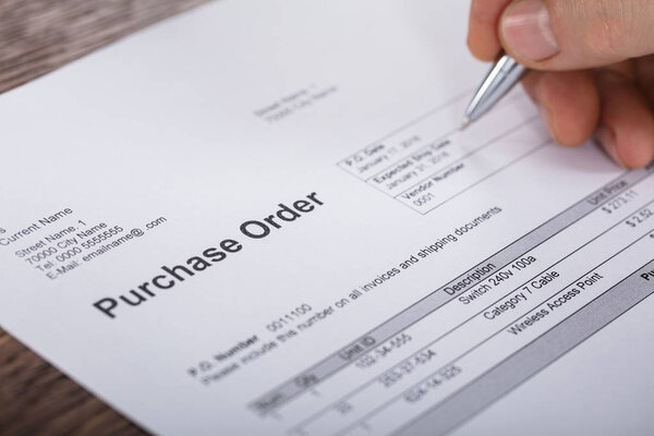 Person Filling Purchase Form