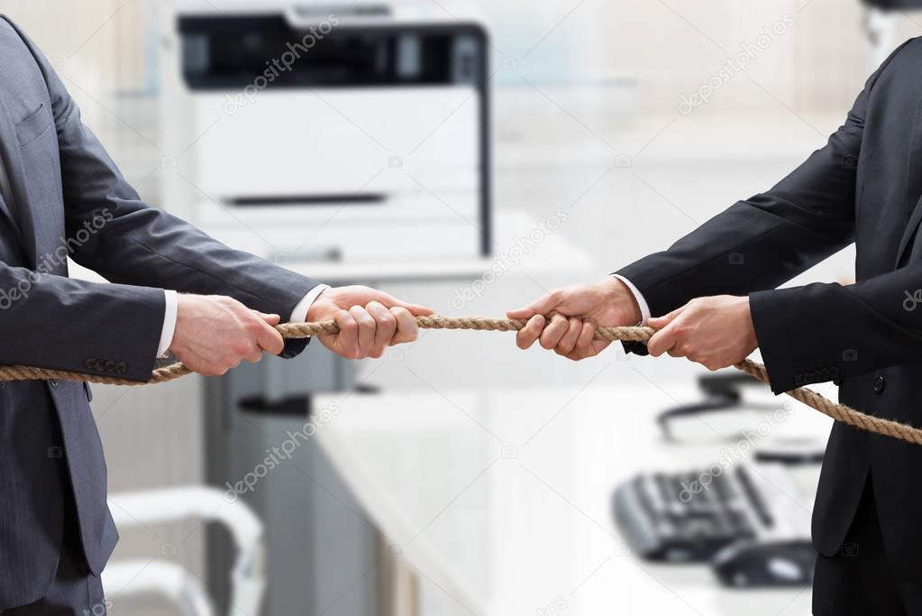  Businessmen Hand Playing Tug Of War