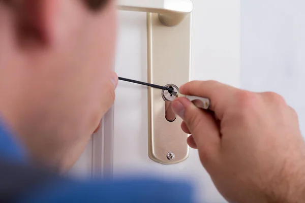 Lockpicker Fixing Door Handle — Stock Photo, Image