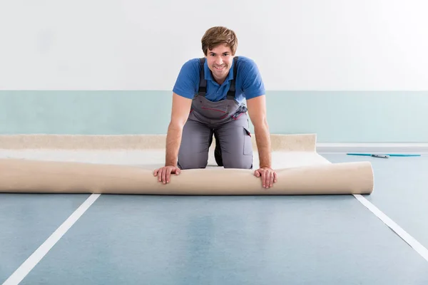 Young Man Laying Carpet — Stock Photo, Image