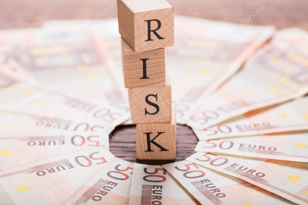 Risk Concept On Wooden Bricks
