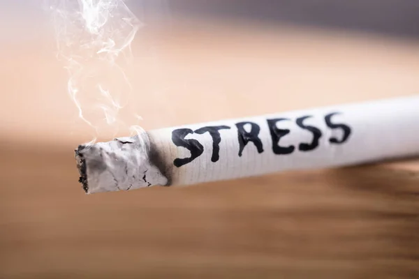 Stress Word On Burning Cigarette — Stock Photo, Image