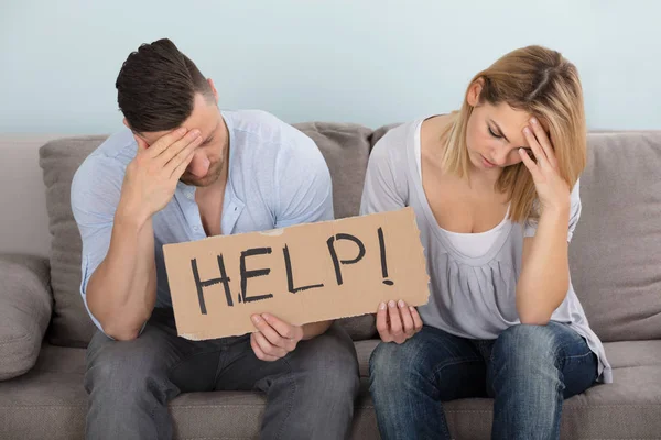 Orolig par hjälp skylt — Stockfoto