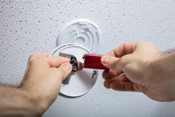 Person Removing Battery — Stock Photo, Image