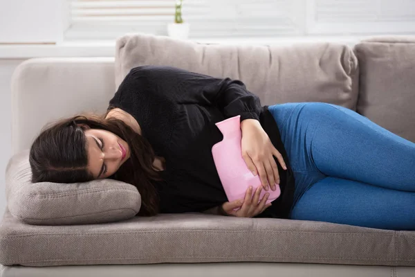 Woman Lying On Couch — Stock Photo, Image