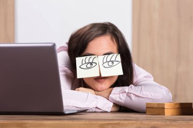 Sleeping Businesswoman Covering Eyes  clipart