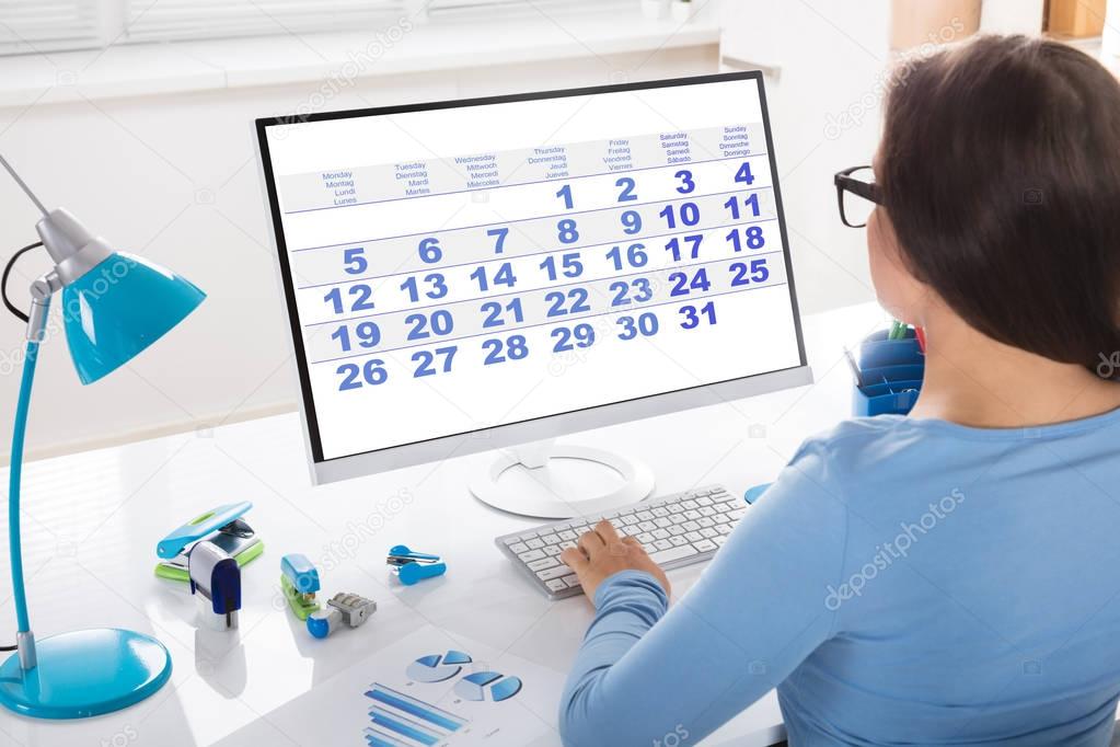 Businesswoman Looking At Calendar 