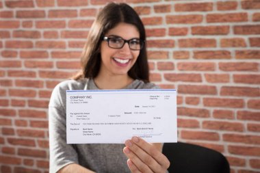 Woman Showing Company Cheque clipart
