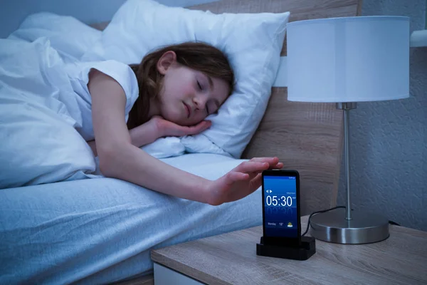 Girl Snoozing Alarm — Stock Photo, Image