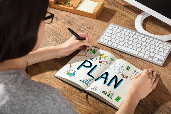 Zakenvrouw tekening Plan grafiek — Stockfoto