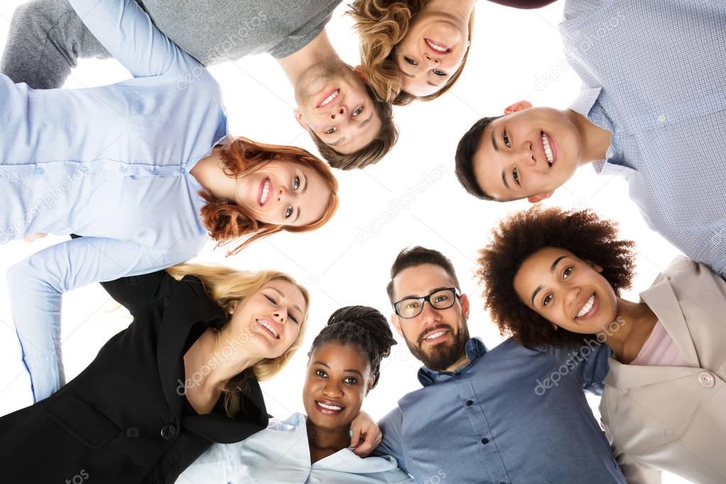 College Students Forming Huddle