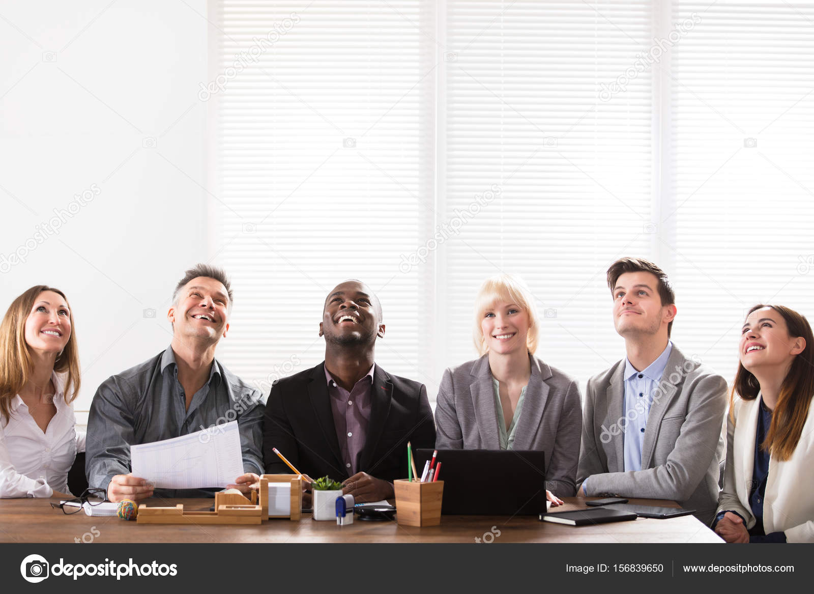 photo Office Diverse Stock Images diverse group businesspeople looking office meeting stock photo image by c andreypopov 156839650